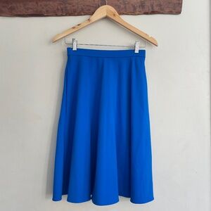 Cynthia Rowley | Bold Solid Blue A-Line Midi Skirt with Pockets XS